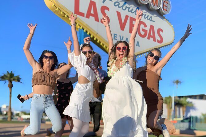 Get Married at the Fabulous Las Vegas Sign + Photos - Flowers, veil, and that aisle moment that photographs well